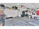 Spacious garage with ample storage solutions, perfect for vehicles and organization at 8747 Mesquite Row, Lone Tree, CO 80124