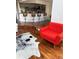 Living room featuring hardwood floors, a bar, and comfortable seating at 8747 Mesquite Row, Lone Tree, CO 80124