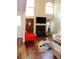 Bright living room featuring a fireplace and ample natural light at 8747 Mesquite Row, Lone Tree, CO 80124