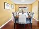 Dining room showcasing modern furnishings, hardwood floors, and natural light at 85 Yank Way, Lakewood, CO 80228