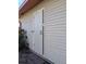 Exterior of home showing door and beige siding at 85 Yank Way, Lakewood, CO 80228