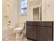Bright bathroom with white subway tile, undermount sink, and espresso vanity at 10736 Snowdon St, Parker, CO 80134