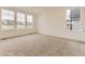 Spacious bedroom with large windows and neutral carpeting at 10736 Snowdon St, Parker, CO 80134