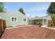 Charming home featuring a mulched backyard with a covered patio area perfect for outdoor relaxation at 1892 S Fairfax St, Denver, CO 80222
