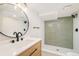 Bright bathroom showcasing modern fixtures, a vanity, and shower at 1892 S Fairfax St, Denver, CO 80222