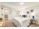 Cozy bedroom featuring carpet, natural light, and decorative wall art at 1892 S Fairfax St, Denver, CO 80222