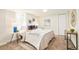Cozy bedroom featuring carpet, natural light, and decorative wall art at 1892 S Fairfax St, Denver, CO 80222
