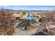 Aerial view of a community park with a gazebo set against a scenic mountain backdrop at 4116 W 111Th Cir, Westminster, CO 80031