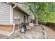 Back patio featuring outdoor seating area with natural shade from mature trees at 4116 W 111Th Cir, Westminster, CO 80031