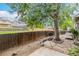 Landscaped backyard with a beautiful tree at 4116 W 111Th Cir, Westminster, CO 80031