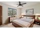 Modern bedroom featuring a large window, stylish furnishings, and ample natural light at 4116 W 111Th Cir, Westminster, CO 80031
