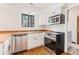 Bright kitchen with stainless steel appliances, butcher block countertops and ample cabinet space at 4116 W 111Th Cir, Westminster, CO 80031