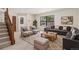 Inviting living room featuring a large window, comfortable seating, and a cozy rug at 4116 W 111Th Cir, Westminster, CO 80031