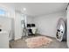 Bedroom boasts natural light, and an office setup with two monitors at 5390 Rosemary Ln, Denver, CO 80221