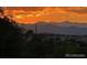 Picturesque sunset view with silhouette of distant mountains at 8627 Gold Peak Pl # C, Highlands Ranch, CO 80130