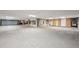 Spacious unfinished basement with concrete walls and floor provides plenty of storage at 1629 S Deframe St # A1, Lakewood, CO 80228