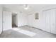 Spacious bedroom with plush carpeting and ample closet space at 1629 S Deframe St # A1, Lakewood, CO 80228