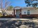 Charming clubhouse with brick accents and accessible parking, offering a welcoming community space at 1629 S Deframe St # A1, Lakewood, CO 80228