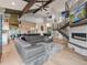 Spacious open-concept living space features kitchen, dining, living and open staircase at 12947 Lazy Dog Ln, Littleton, CO 80127
