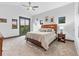 Spacious main bedroom with a large window showcasing stunning outdoor views at 12947 Lazy Dog Ln, Littleton, CO 80127