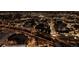 Nighttime aerial view of a cityscape featuring illuminated buildings and roads at 1133 14Th St # 3430, Denver, CO 80202