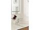 Elegant bathroom detail showcasing sleek faucet, marble countertop, and decorative flower at 1133 14Th St # 3430, Denver, CO 80202