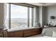 Bright bedroom with large window, city views, and cozy window seating and mountain views at 1133 14Th St # 3430, Denver, CO 80202