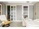 Comfortable office space with sliding glass doors, custom built-ins, and lots of light at 1133 14Th St # 3430, Denver, CO 80202
