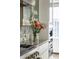 Kitchen features stainless steel appliances, flowers on counter, and skyline views at 1133 14Th St # 3430, Denver, CO 80202