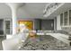 Bright, modern kitchen with white island, marble countertops, and crystal chandelier at 1133 14Th St # 3430, Denver, CO 80202
