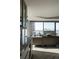 Bright living room with a fireplace, floor to ceiling windows, and incredible city views at 1133 14Th St # 3430, Denver, CO 80202