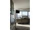 Open living room with fireplace, contemporary furniture, and expansive city views at 1133 14Th St # 3430, Denver, CO 80202