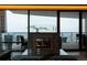 Comfortable living room with fireplace and expansive city skyline views at 1133 14Th St # 3430, Denver, CO 80202