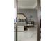 Cozy main bedroom featuring tile floors, a large bed, and ample storage at 1133 14Th St # 3430, Denver, CO 80202
