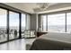 Spacious main bedroom with floor-to-ceiling windows that showcase the city and mountains at 1133 14Th St # 3430, Denver, CO 80202