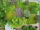 Aerial view of the property showcasing a well-maintained yard and mature trees at 2680 S Garfield Cir, Denver, CO 80210