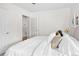 Spacious bedroom with white walls and a view of the closet providing ample space at 2680 S Garfield Cir, Denver, CO 80210