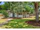 Cozy home with mature trees and a well-manicured lawn at 2680 S Garfield Cir, Denver, CO 80210