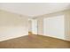 Bedroom with wood floors and closet at 7755 E Quincy Ave # 206, Denver, CO 80237