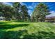 Landscaped community park with mature trees and ample green space at 7455 E Quincy Ave # 204, Denver, CO 80237