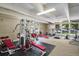 Well-equipped fitness center with various machines at 7455 E Quincy Ave # 204, Denver, CO 80237