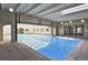 Indoor swimming pool with a glass enclosure at 7455 E Quincy Ave # 204, Denver, CO 80237