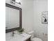 Well-lit powder room featuring a modern vanity with a vessel sink and decorative accents at 22263 Boundstone St, Parker, CO 80138
