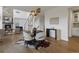 Bright dining room with hardwood floors, modern decor, and staircase in a contemporary home at 22263 Boundstone St, Parker, CO 80138