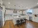 Spacious kitchen with an island, pendant lighting, stainless appliances, and modern cabinetry at 22263 Boundstone St, Parker, CO 80138