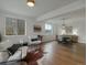 Cozy living room seamlessly connects to the dining area, offering bright natural light and an inviting atmosphere at 22263 Boundstone St, Parker, CO 80138