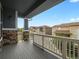 Spacious porch area with a railing and beautiful architectural details, providing a great outdoor space for relaxing at 22263 Boundstone St, Parker, CO 80138