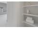 Walk-in closet with built-in shelving and storage solutions for organization and style at 15348 W 75Th Pl, Arvada, CO 80007