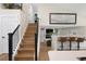 Open-concept living room with view of stairs to the second floor at 613 N Brentwood Ct, Castle Rock, CO 80104