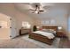 Tranquil main bedroom with vaulted ceilings, ceiling fan, and a plush carpet at 6358 S Miller Way, Littleton, CO 80127